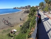 TURISTAS EN PLAYA BIL BIL