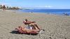 TURISTAS TOMANDO EL SOL EN PLAYA LOS MAITES EL 10 DE NOVIEMBRE